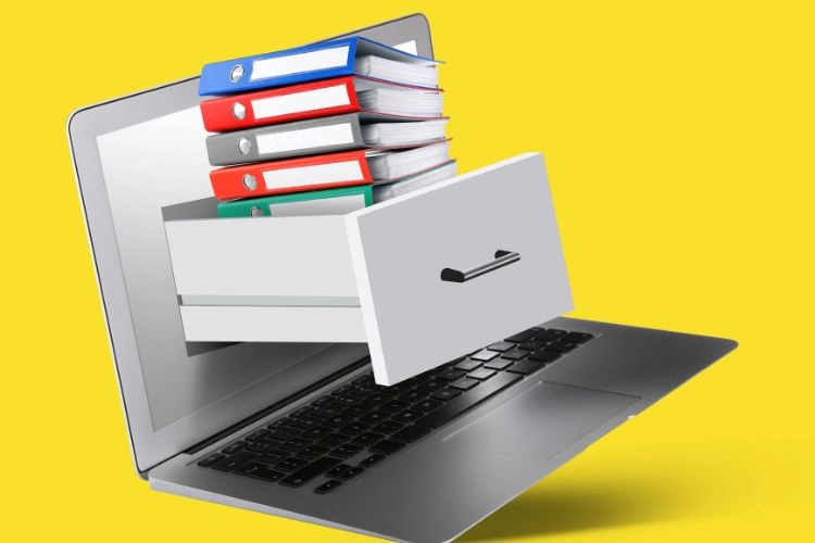 Illustration d'un tiroir de documents dans un ordinateur représentant la numérisation des documents en entreprise