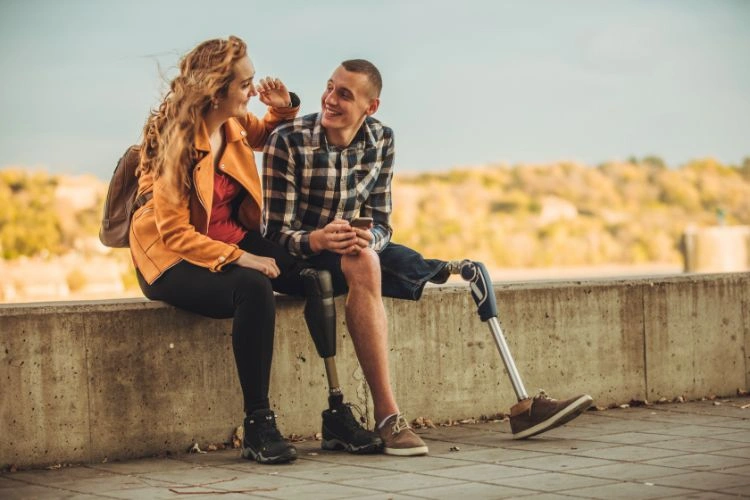 Deux handicapés assis